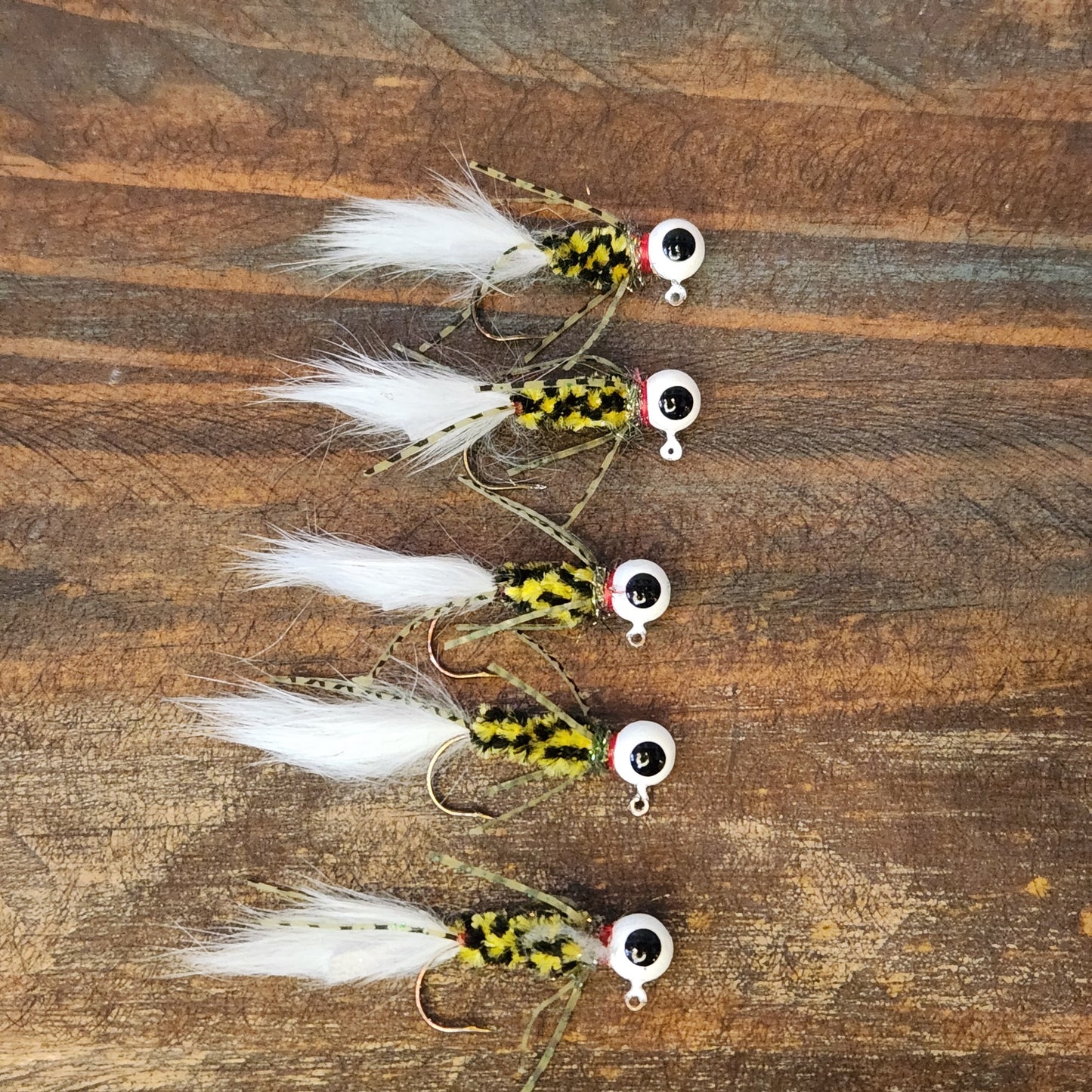5 pack of the "Crappie Crawler" 1/16 or 1/8 ounce Crappie Jigs, Hand tied.